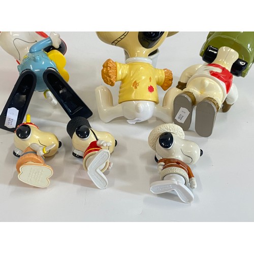 245 - Snoopy models in various sizes, plus egg cup