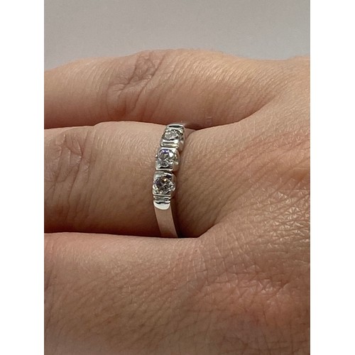 92 - 18ct white gold and diamond trilogy ring, stamped .40, size O/P. Stamped 750 Hallmarked London.