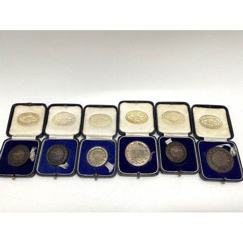 208 - A group of 1930's medallions some of which are hallmarked silver, pertaining to sport at 'Rishworth ... 