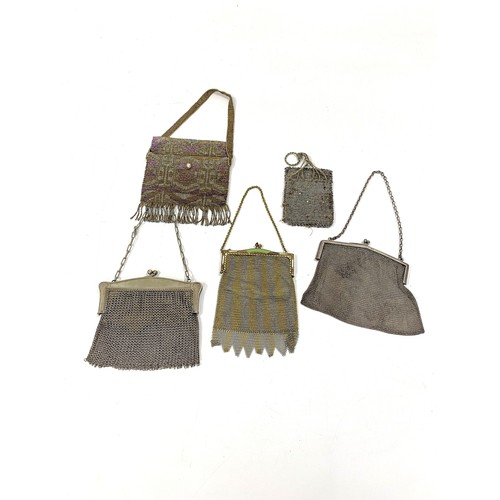 178B - Collector's group of antique ladies mesh and beaded bags, some of which are silver and white metal.