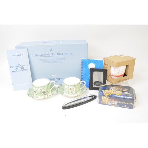 22 - Millennium items to include Wedgwood 'A Celebration of the Millennium' pair of cups and saucers , bo... 