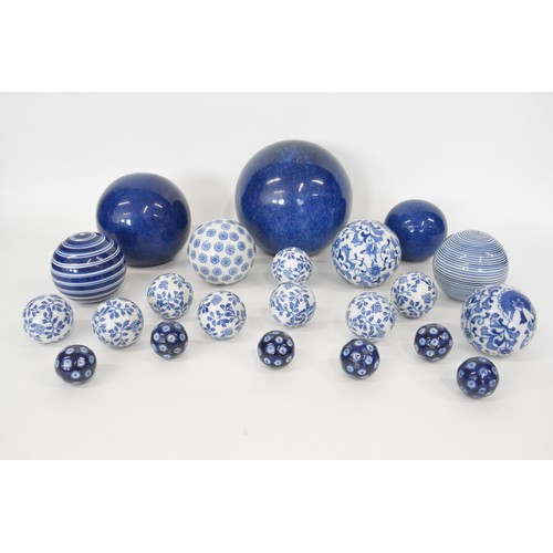 31 - Various selection of  ceramic spheres, bowls , blue and white, approx sizes 19cms largest and 4 cms ... 