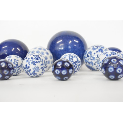 31 - Various selection of  ceramic spheres, bowls , blue and white, approx sizes 19cms largest and 4 cms ... 