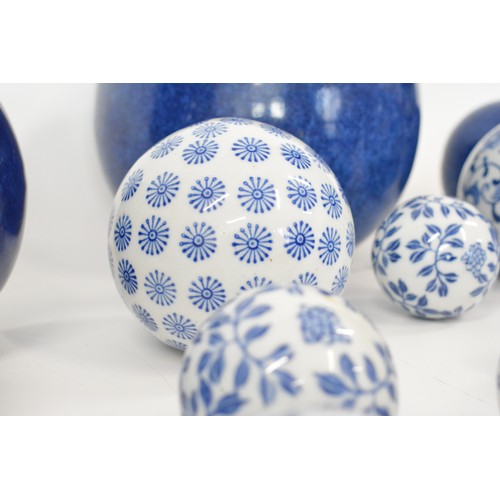 31 - Various selection of  ceramic spheres, bowls , blue and white, approx sizes 19cms largest and 4 cms ... 