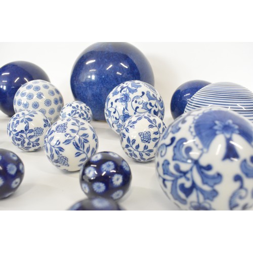 31 - Various selection of  ceramic spheres, bowls , blue and white, approx sizes 19cms largest and 4 cms ... 