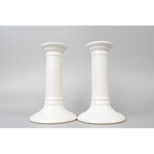 32 - Pair of Royal Doulton glazed candlesticks together with Portmerion 'Parian' bisque figurine candle h... 