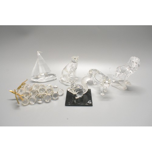 37 - An assortment of Swarovski crystal ornaments, to include 10th anniversary 1997 squirrel on designer ... 