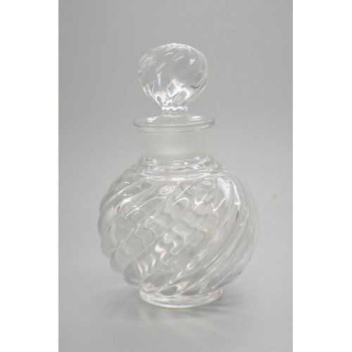 38 - Baccarat swirl design glass perfume bottle, height 11cms high with markings to base of bottle and ba... 