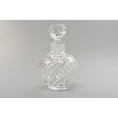 38 - Baccarat swirl design glass perfume bottle, height 11cms high with markings to base of bottle and ba... 