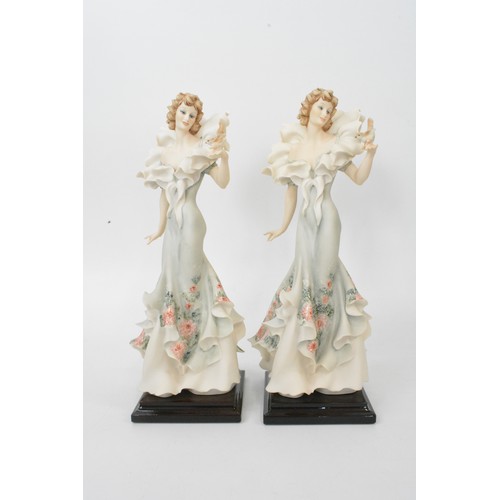 47 - Two Giuseppe Armani figurines, Pretty Woman model nos. 1938C and 1938C, boxed. height 35 cms