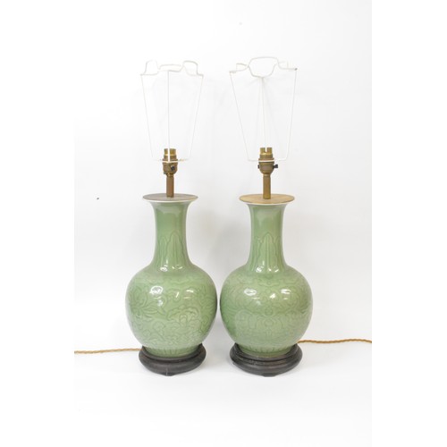 54 - Pair of vintage  green ceramic lamps on wooden base,  approx height 64cms, PAT tested.