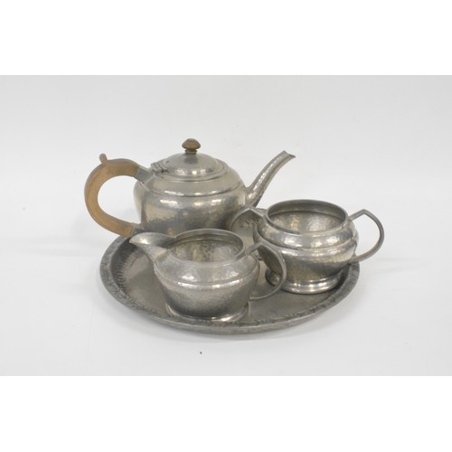 61 - Hugh Wallis arts & crafts pewter tray together with hammered Walker & Hall teapot, jug and bowl set