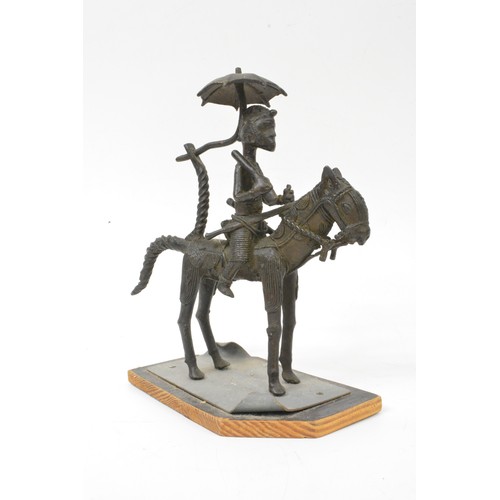 74 - African Tribal statue; horse with female warrior rider, approx H 23cm.