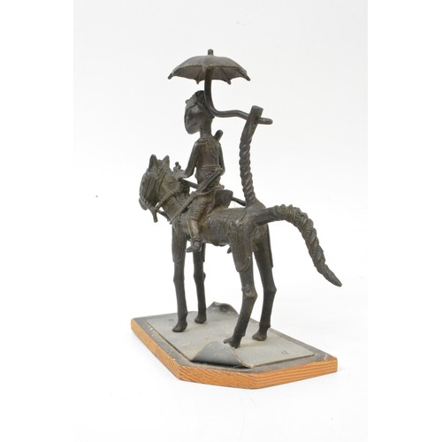 74 - African Tribal statue; horse with female warrior rider, approx H 23cm.