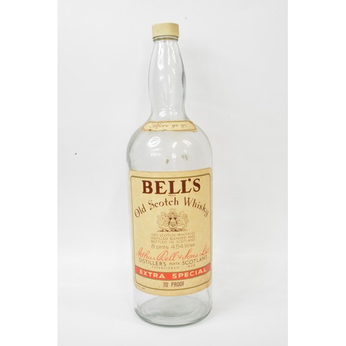 97 - Large Bell's Old Scotch Whisky 8 Pint glass bottle with top, ideal money box