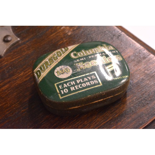 122 - Vintage cased gramaphone with tin of needles