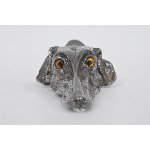 125 - Silver plated letter holder in  the form of a greyhound head, with glass eyes, length approx 15 cms