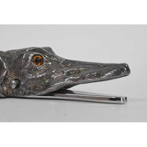 125 - Silver plated letter holder in  the form of a greyhound head, with glass eyes, length approx 15 cms