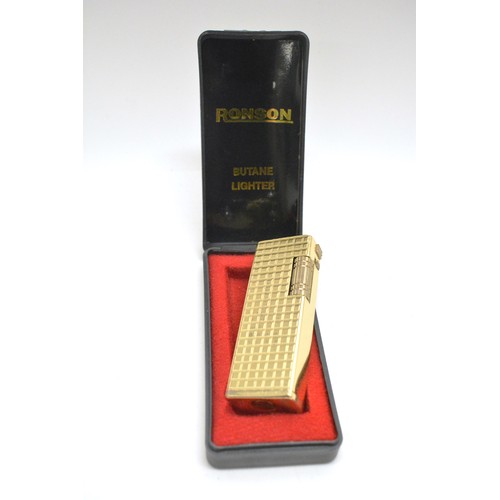 140 - Lighters x 9  to include boxed gold coloured ronson lighter, ronson table lighter, ronson cadet, mos... 