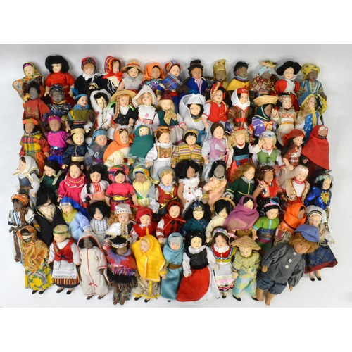 176 - A group of vintage porcelain dolls, in tradtional attire.