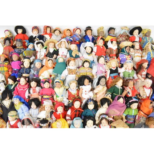 176 - A group of vintage porcelain dolls, in tradtional attire.