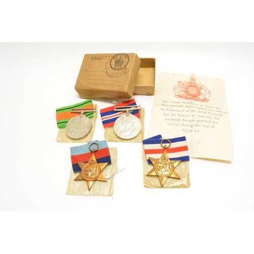 236 - 1939 - 45 Medal group consisting of four medals including The France and Germany Star with box and p... 