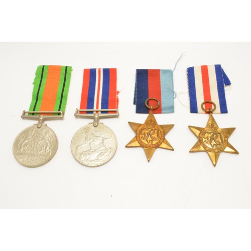 236 - 1939 - 45 Medal group consisting of four medals including The France and Germany Star with box and p... 