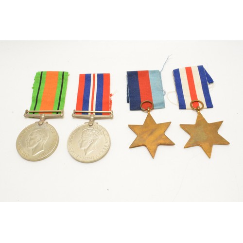 236 - 1939 - 45 Medal group consisting of four medals including The France and Germany Star with box and p... 