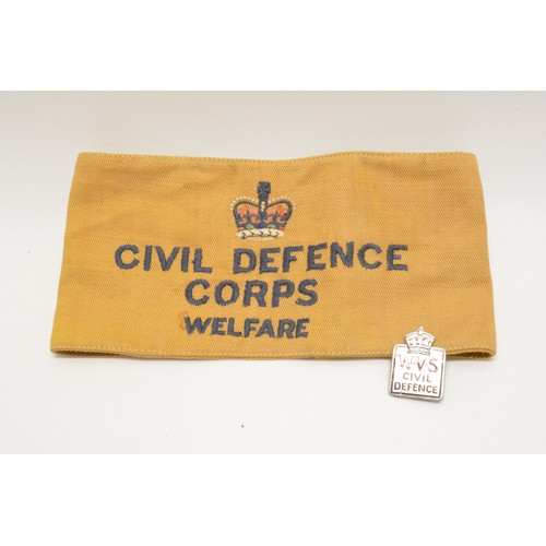 238 - Civil Defence Corps Welfarm arm band together with group of badges and buttons including WVS Civil D... 