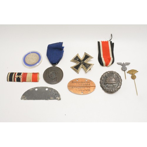 248 - German Military interest items consisting Fur Treue Drenste Inder medal, Wound badge,  Iron Cross br... 