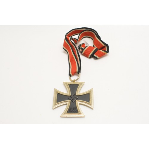 251 - WW2 German Military iron cross with ribbon