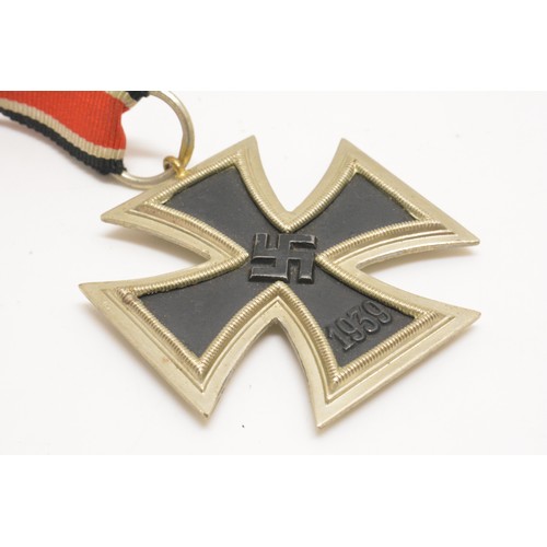 251 - WW2 German Military iron cross with ribbon