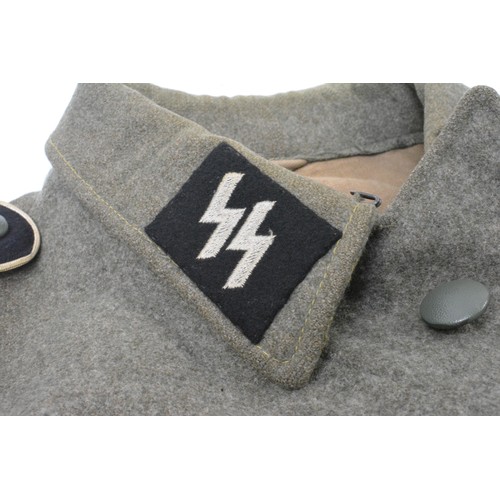 254 - German SS Military Tunic with badges