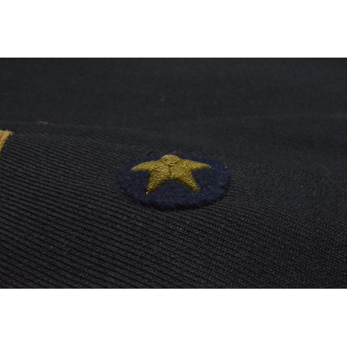 256 - WW2 German clothing items consisting; Kriegsmarine Leiutenant's blue tunic complete with insignia br... 