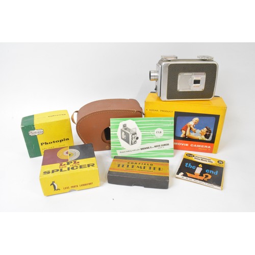 275 - Boxed Brownie Movie Camera together with other photography related items