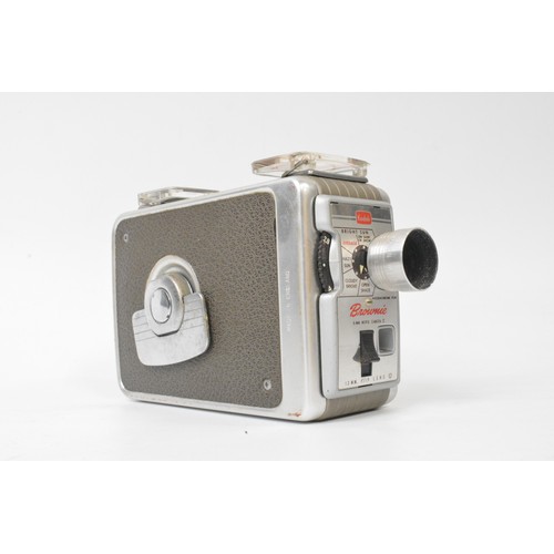 275 - Boxed Brownie Movie Camera together with other photography related items