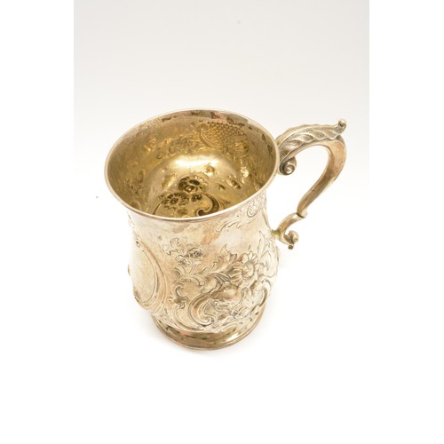 282 - Victorian Silver tankard,  embossed design, possibly Robert Harper, hallmarked London 1865, approx g... 