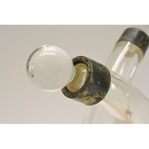 284 - Antique oil/vinegar bottle with silver hallmarked collars, London, glass ball stoppers.