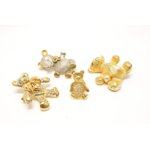 303 - Group of teddy bear themed jewellery items of brooches, pin badges and necklace, includes teddy bear... 