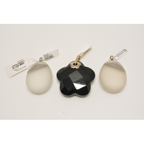 317 - Two Skagen (Denmark) white stone pendants together with silver and black Onyx flower design oversize... 