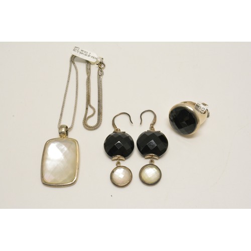 320 - Silver faceted black agate and mother of pearl items consisting ring, necklace and earrings, all sta... 