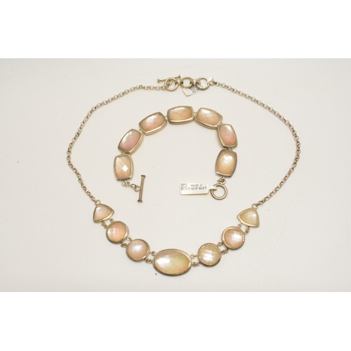 323 - Silver faceted mother of pearl necklace stamped 925 together with co-ordinating silver bracelet, bot... 