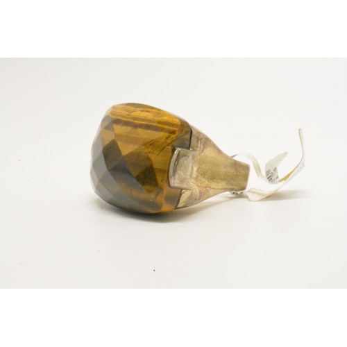 328 - Silver and faceted Tigers Eye rectangular ring together with co-ordinating Tigers Eye silver earring... 