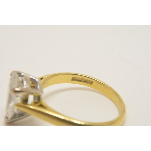 337 - 18ct yellow gold solitaire ring set with a pear shaped diamond, approx 1.50ct, set in an 18ct white ... 