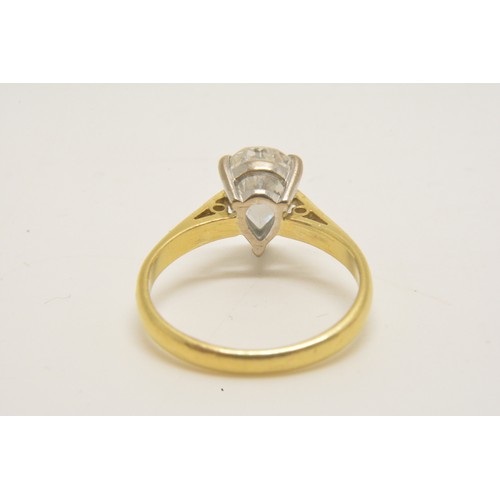 337 - 18ct yellow gold solitaire ring set with a pear shaped diamond, approx 1.50ct, set in an 18ct white ... 