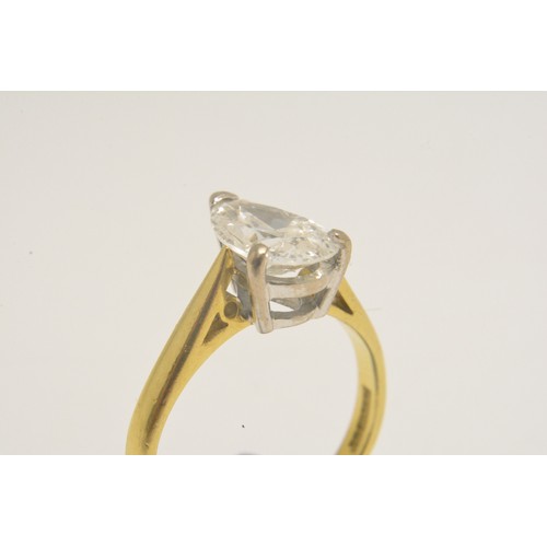 337 - 18ct yellow gold solitaire ring set with a pear shaped diamond, approx 1.50ct, set in an 18ct white ... 