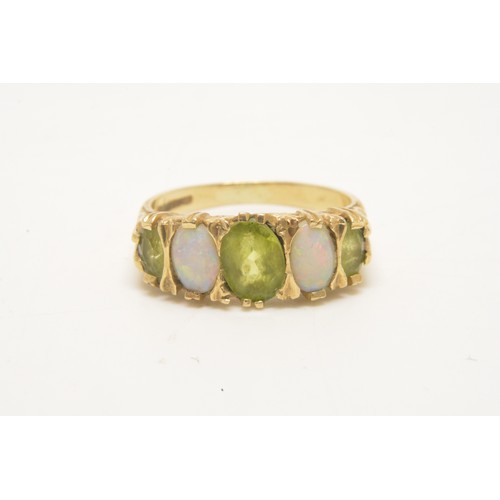 343 - x2 9ct gold rings, one with opal/green stone. Approx size M. Approx gross weight 5.35g