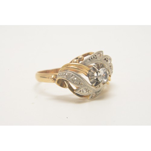 349 - 9ct yellow gold  ring with clear stones in swirl design. approx. size J.