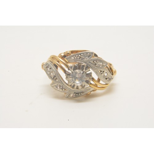 349 - 9ct yellow gold  ring with clear stones in swirl design. approx. size J.