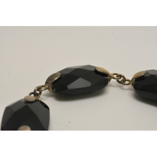 367 - Silver faceted black agate ring, with bracelet  and necklace, all stamped 925, new with tag